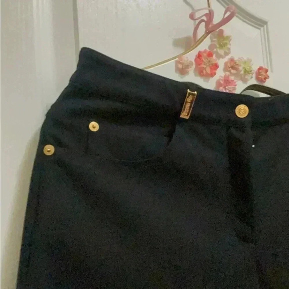 St. John black jeans in new condition . Gorgeous hardware around the belts . - Picture 8 of 14